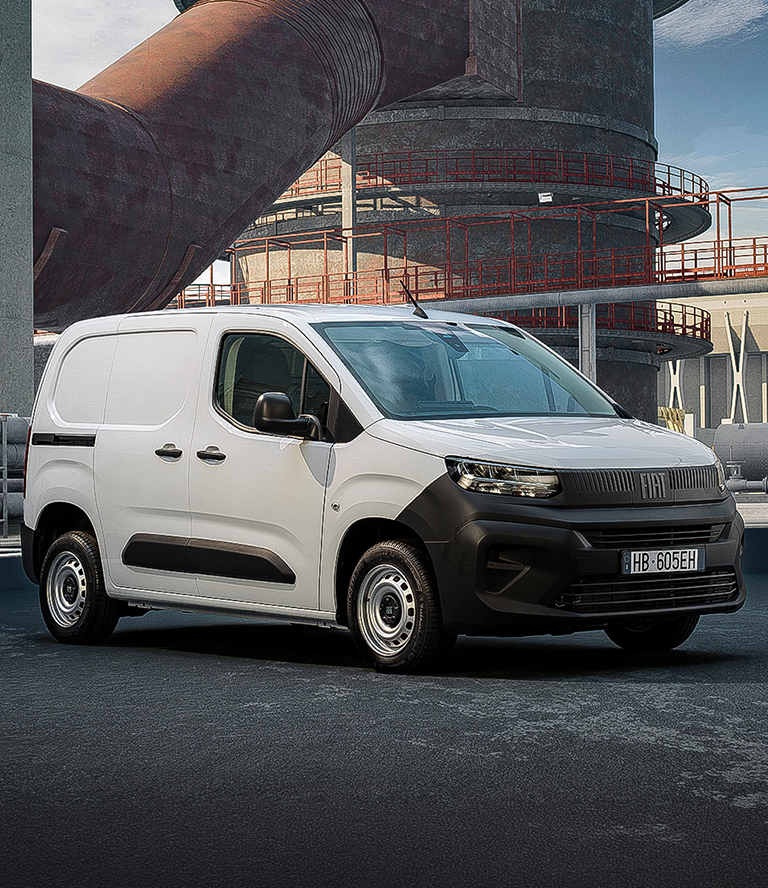 Fiat 500X sur une route de montagne. Kit de réparation de pare-brise Fiat
